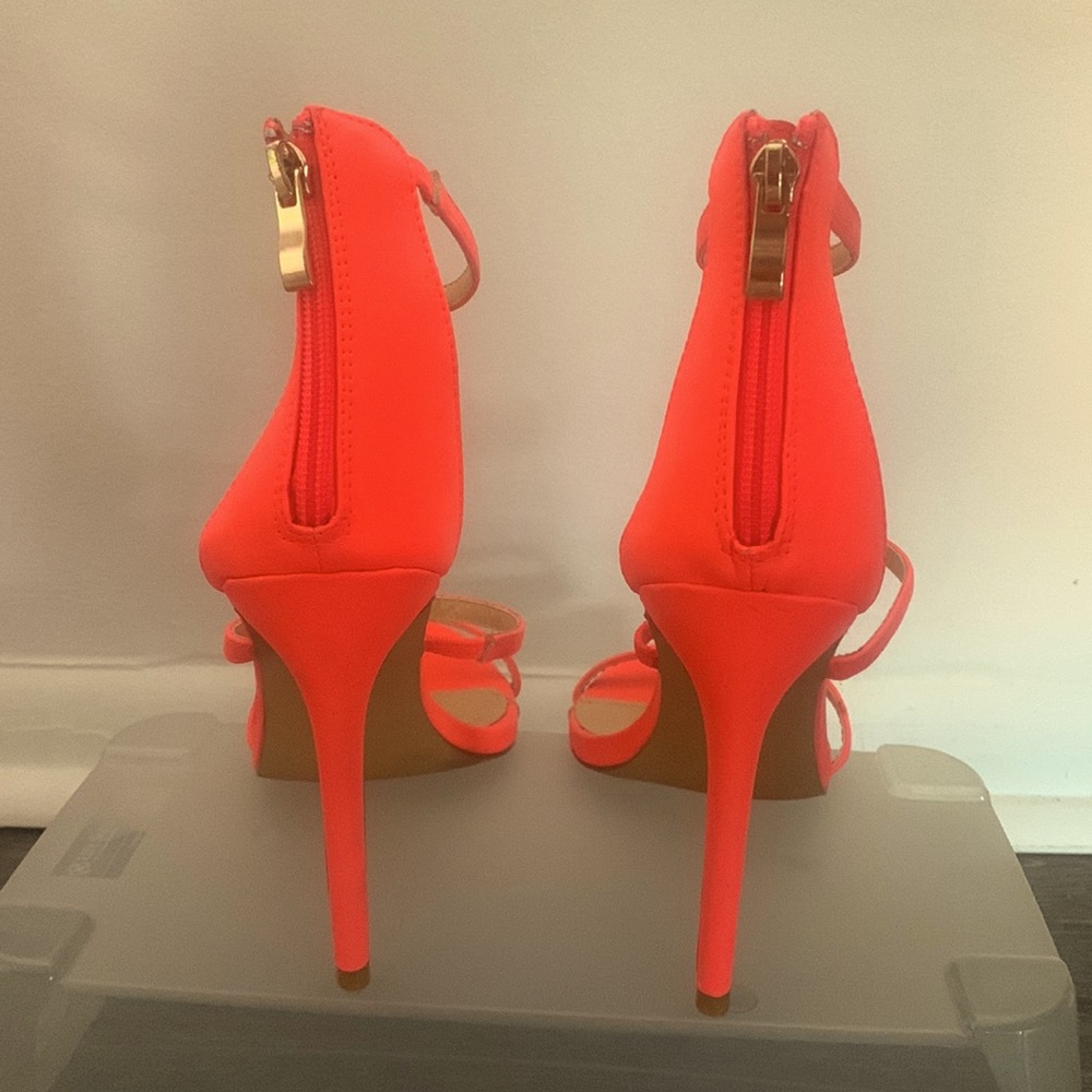 Neon coral stiletto heels